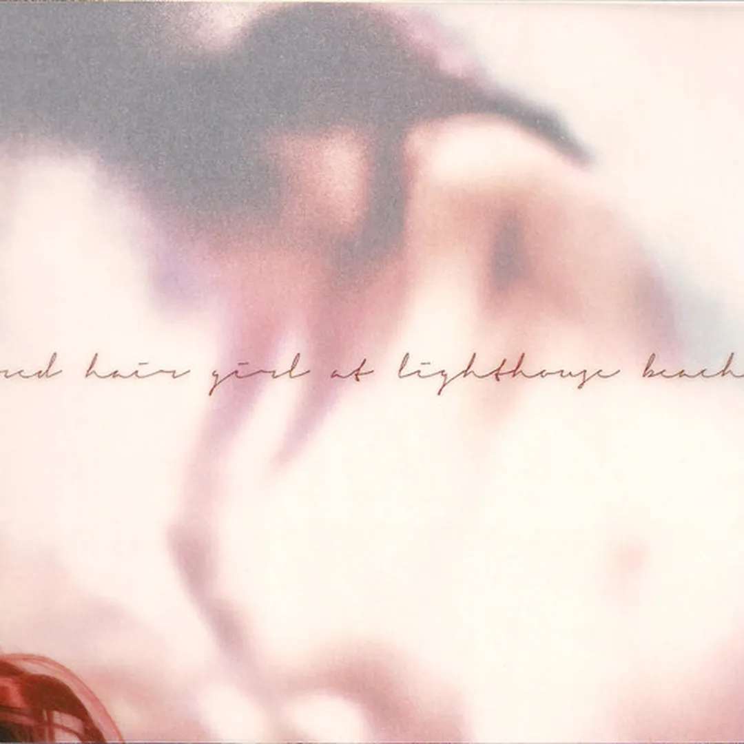 Red Hair Girl at Lighthouse Beach